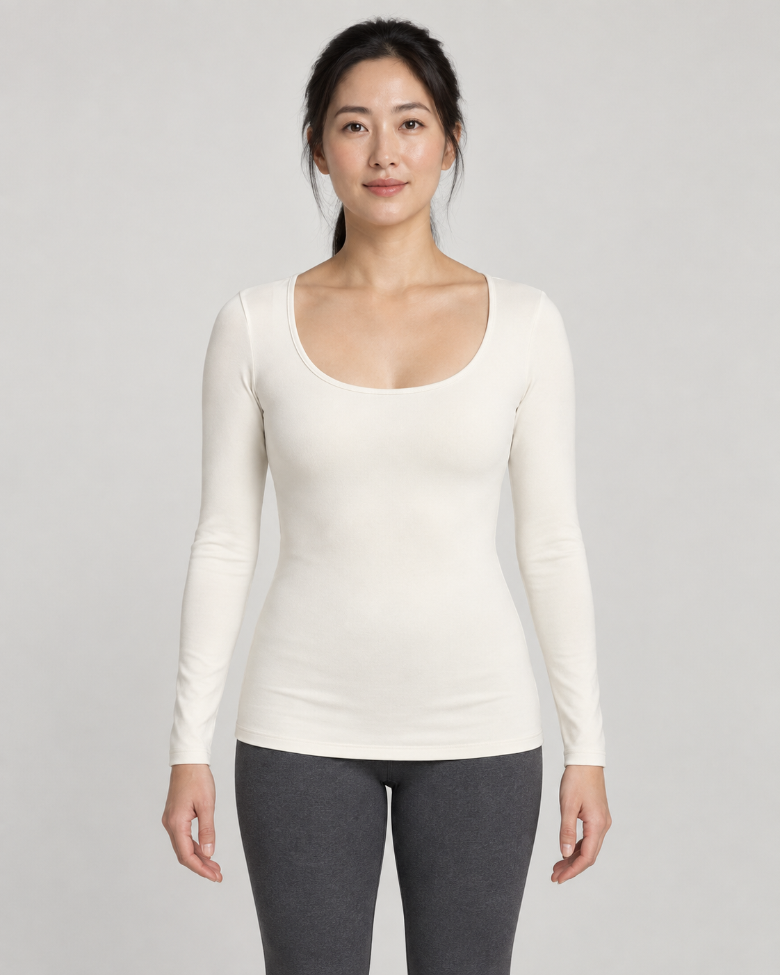 Concept mockup: Akumi Align Scoop Long Sleeve in Chalk, front view on an adult woman.
