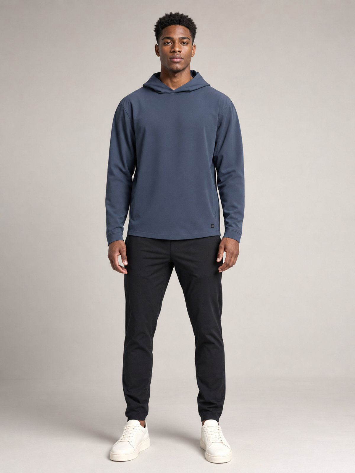 Front view of Akumi AeroLayer Travel Hoodie in slate blue