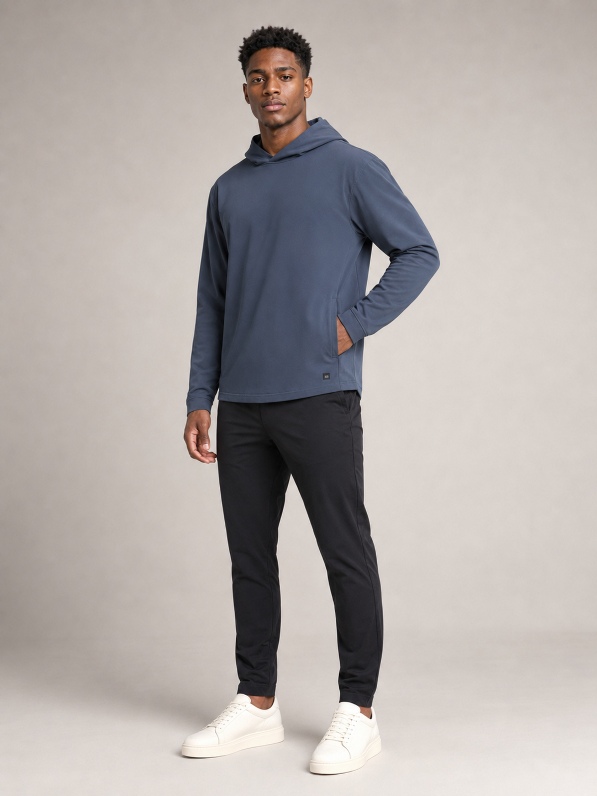 45-degree view of Akumi AeroLayer Travel Hoodie in slate blue