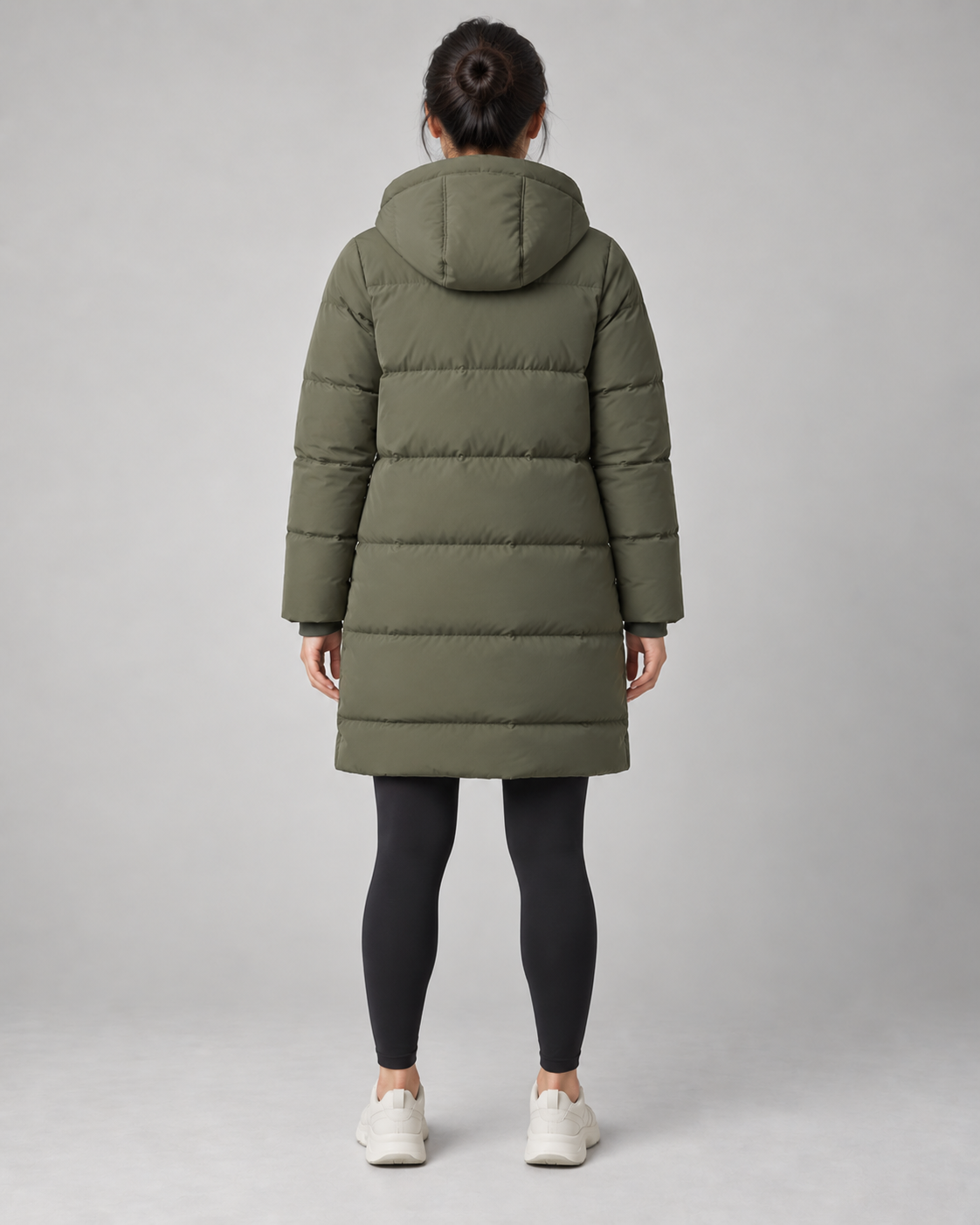 AI-generated design concept: Akumi Arc Longline Puffer in Moss, back view.