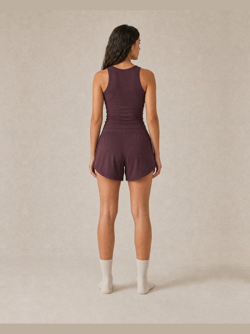 Akumi Arcflow Lounge Short in Deep Fig, women’s back view