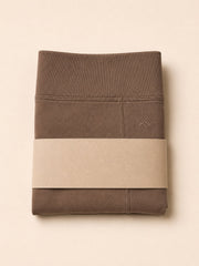 Akumi Bareform Modal Short in Soft Umber folded packaging product shot
