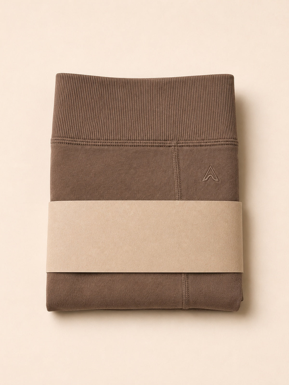 Akumi Bareform Modal Short in Soft Umber folded packaging product shot