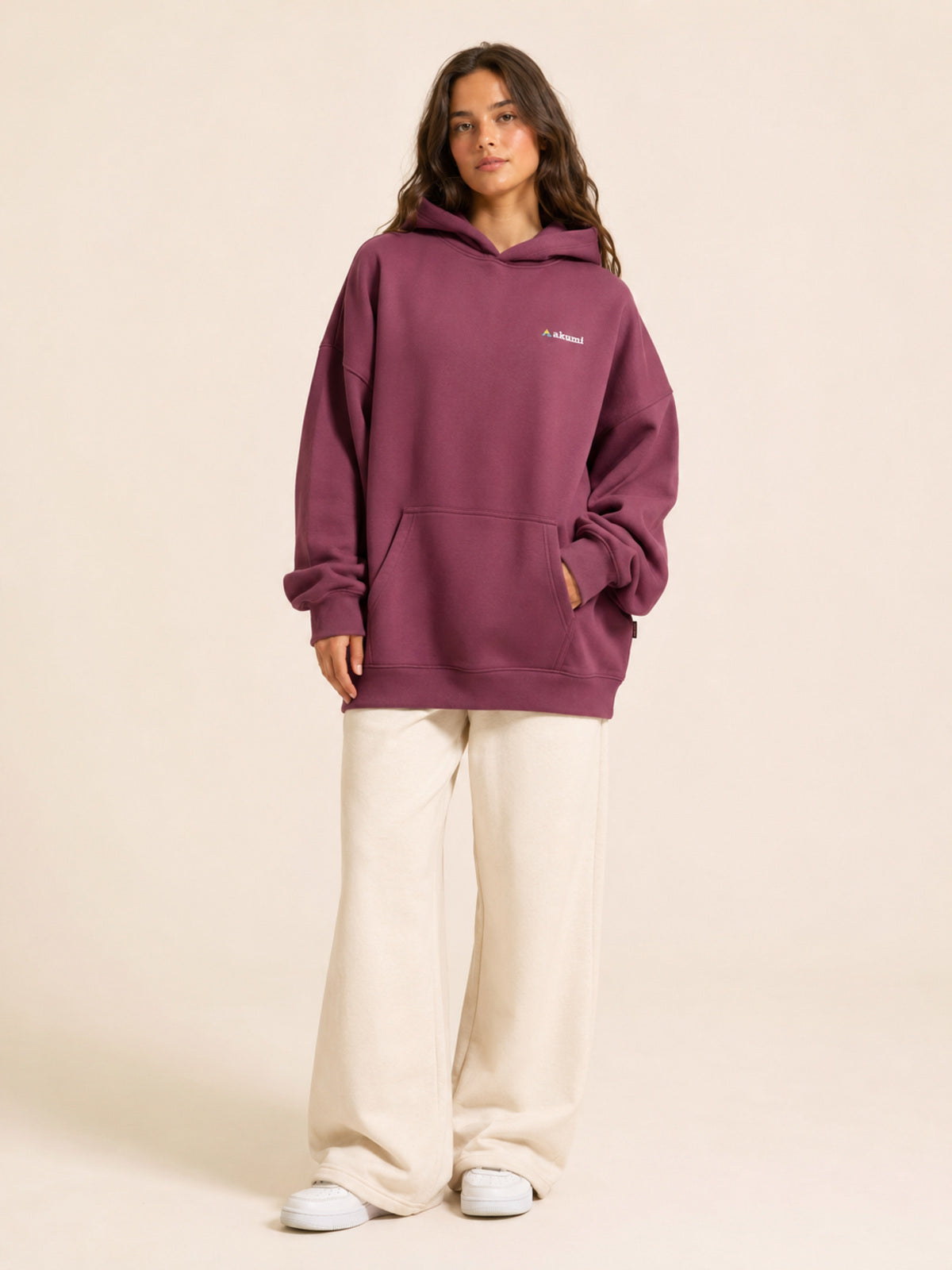 Akumi Baseline Heavyweight Hoodie in Dust Berry oversized fit on model