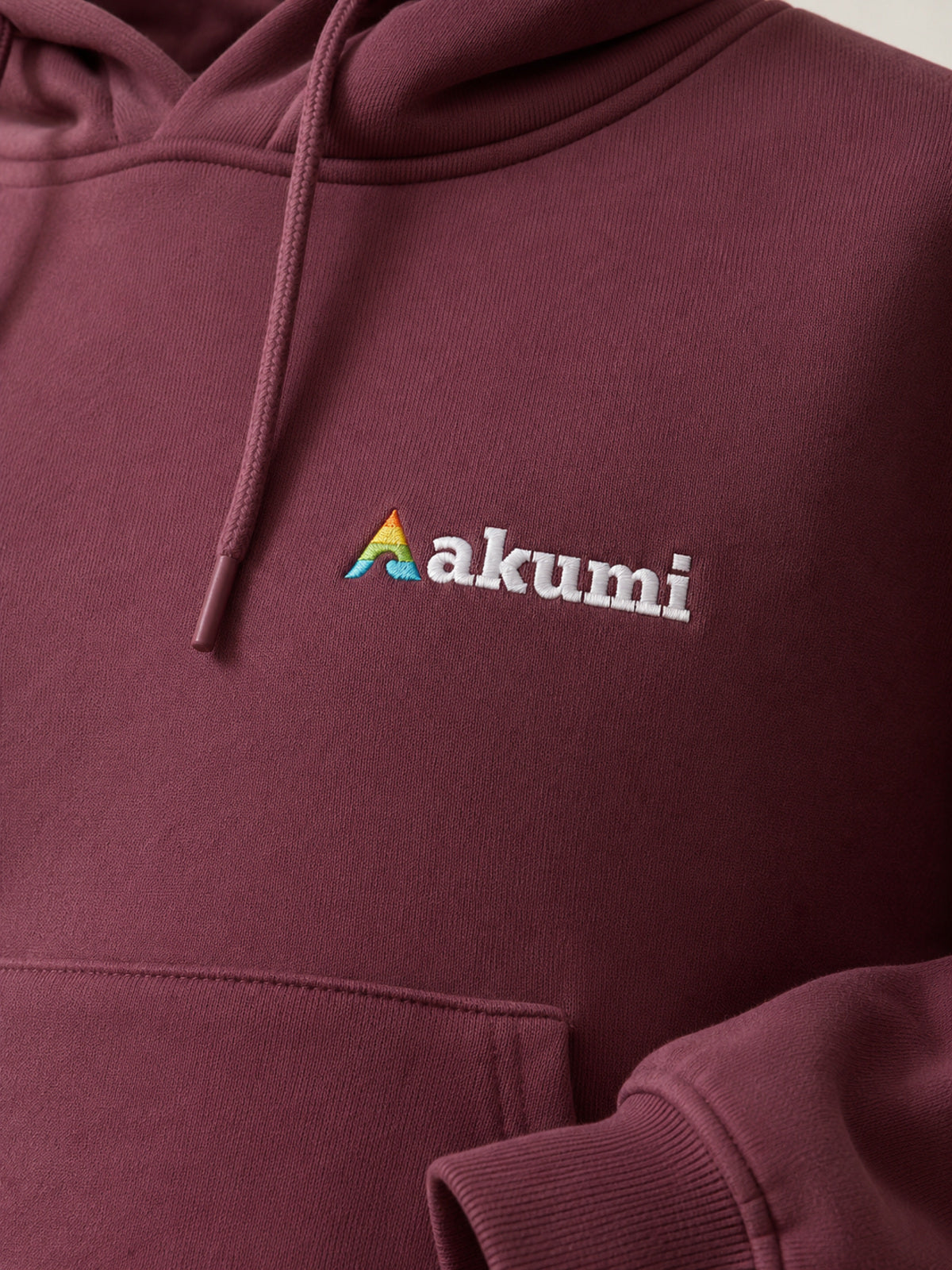 Akumi Baseline Heavyweight Hoodie in Dust Berry embroidered logo detail