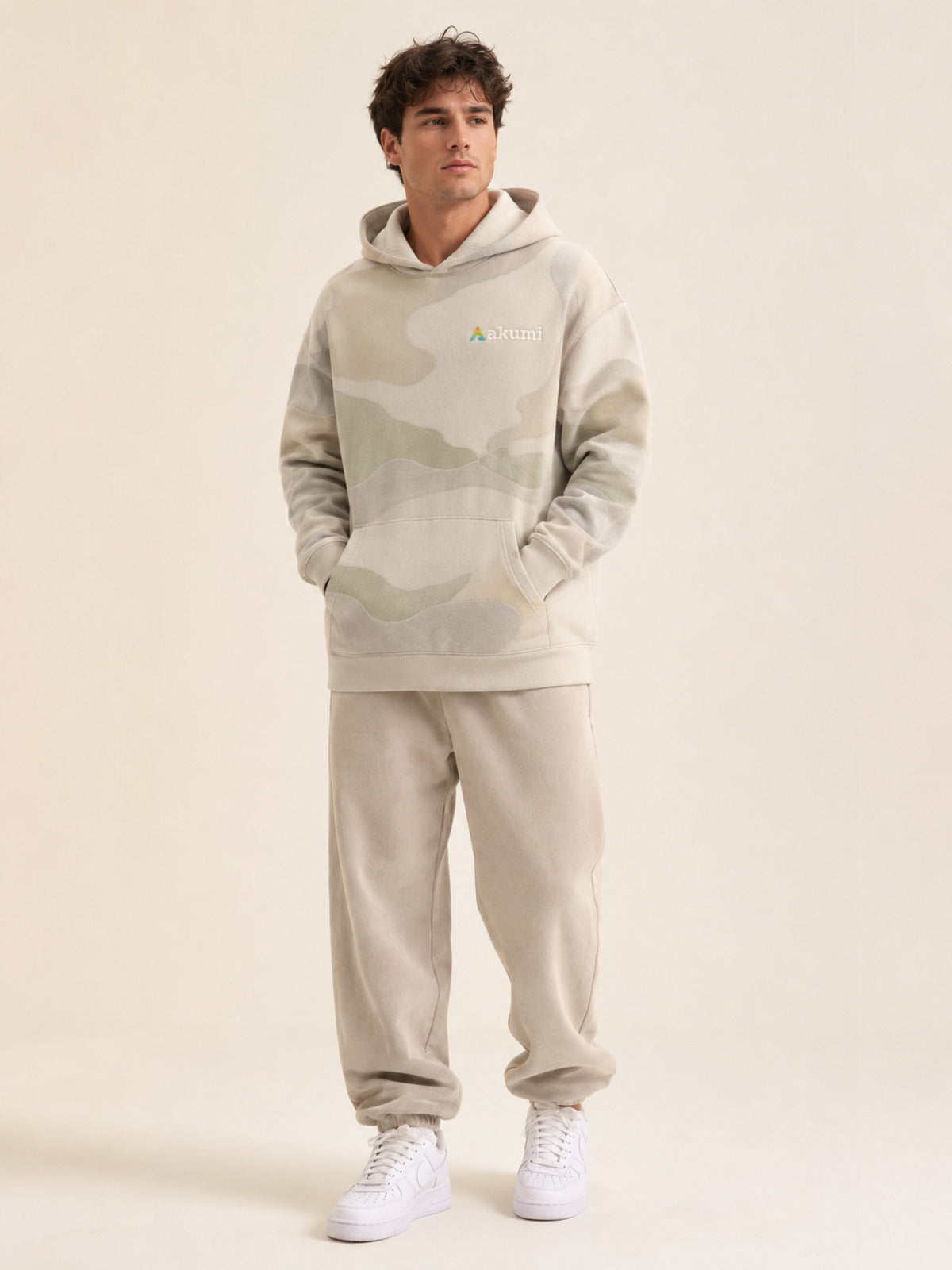 Akumi Terrainwash Hoodie in Bone Terrain male front three-quarter studio hero