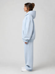 Akumi Cloudline Zip Hoodie in Sky Milk female side studio view