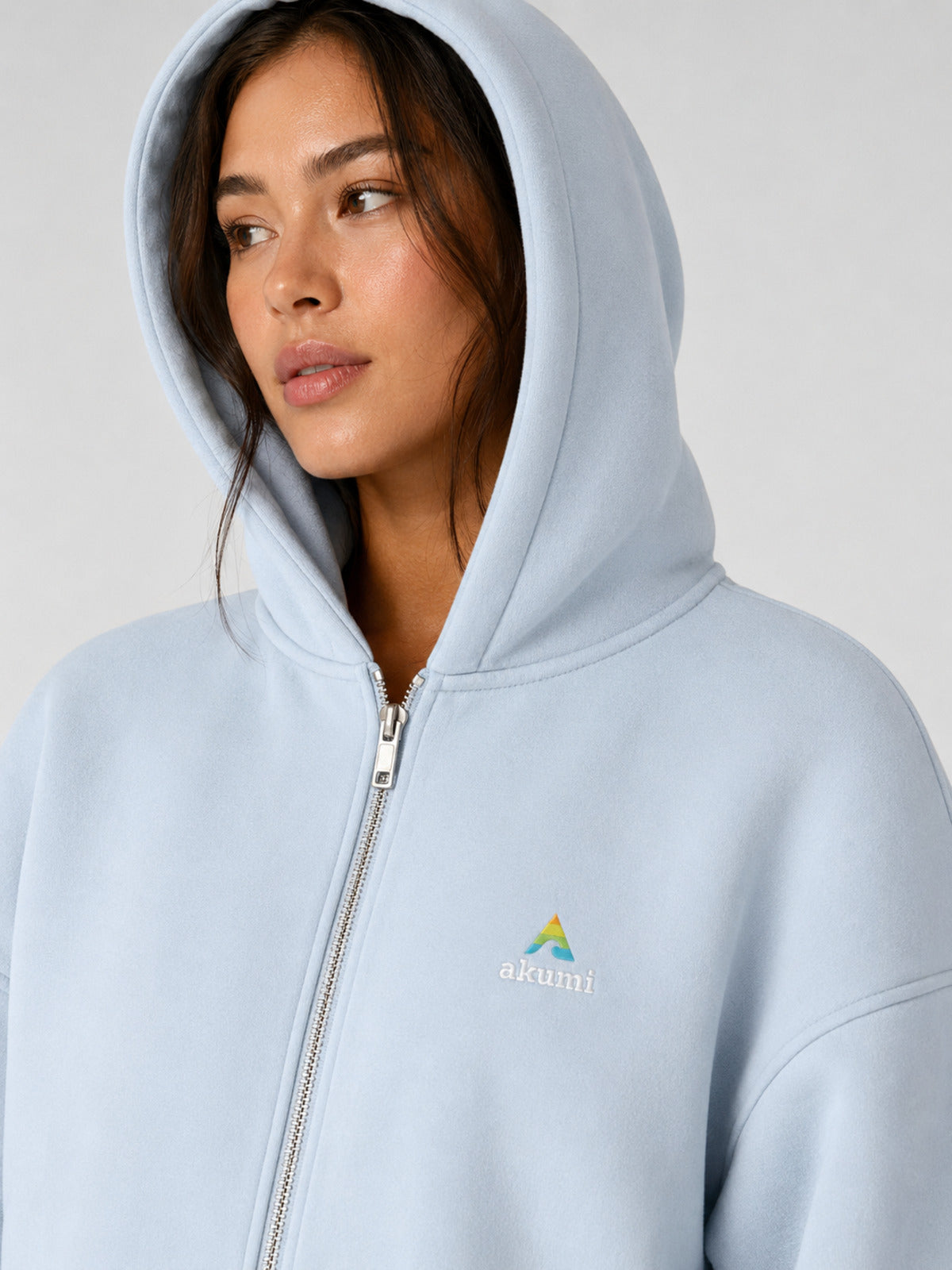 Akumi Cloudline Zip Hoodie in Sky Milk hood zipper and embroidery detail