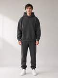 Front view of Akumi Collegiate Motion Hoodie in charcoal