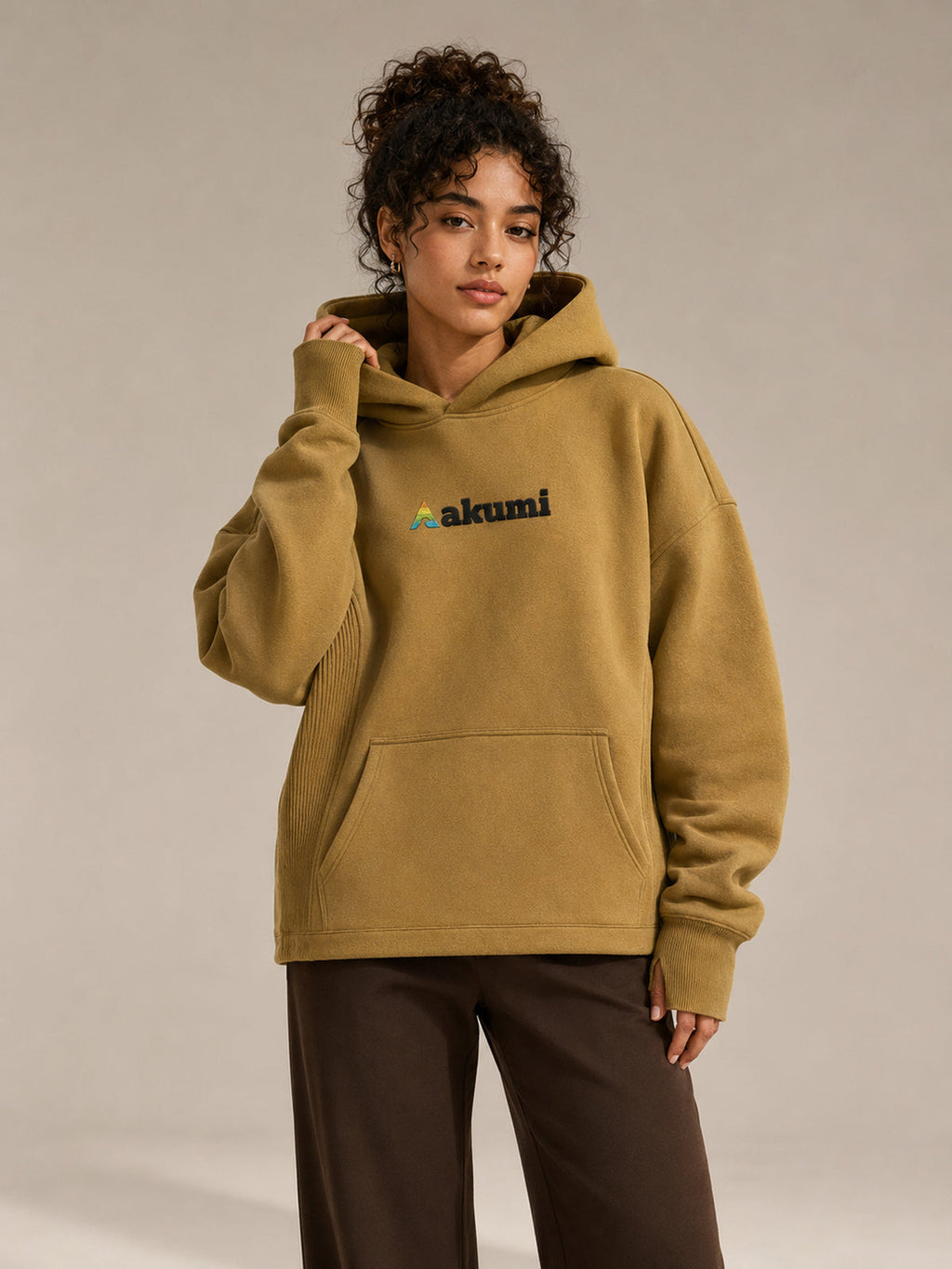 Akumi Crestline Hoodie in Golden Moss — women's front view