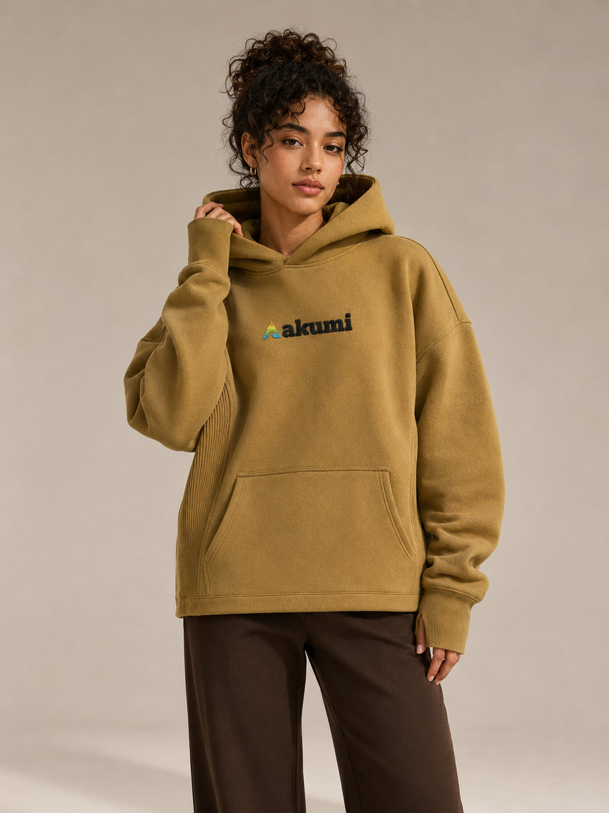 Akumi Crestline Hoodie in Golden Moss — women's front view