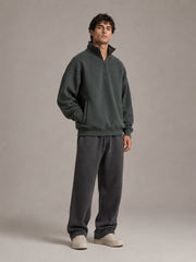Akumi Crestline Quarter Zip in Slate Pine angled front studio view
