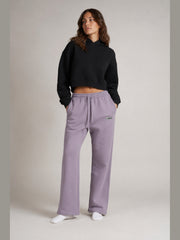 Akumi Crestline Straight-Leg Sweatpant in Lilac Smoke, female model three-quarter front view