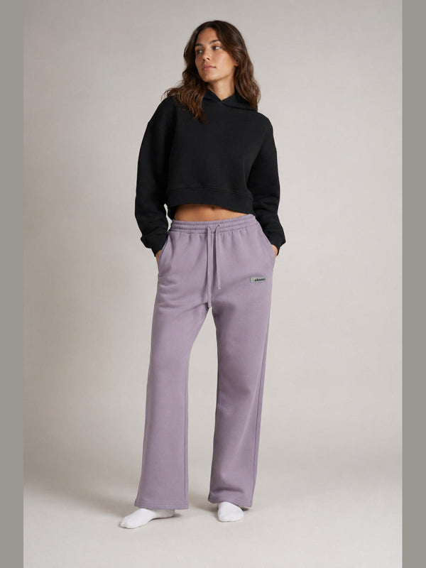 Akumi Crestline Straight-Leg Sweatpant in Lilac Smoke, female model three-quarter front view
