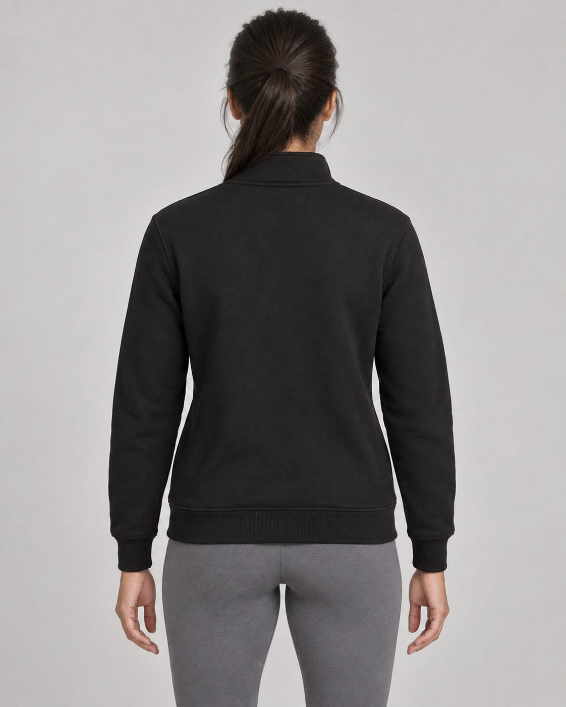 AI-generated design concept: Daybreak Stand-Collar Zip in Onyx, back view.