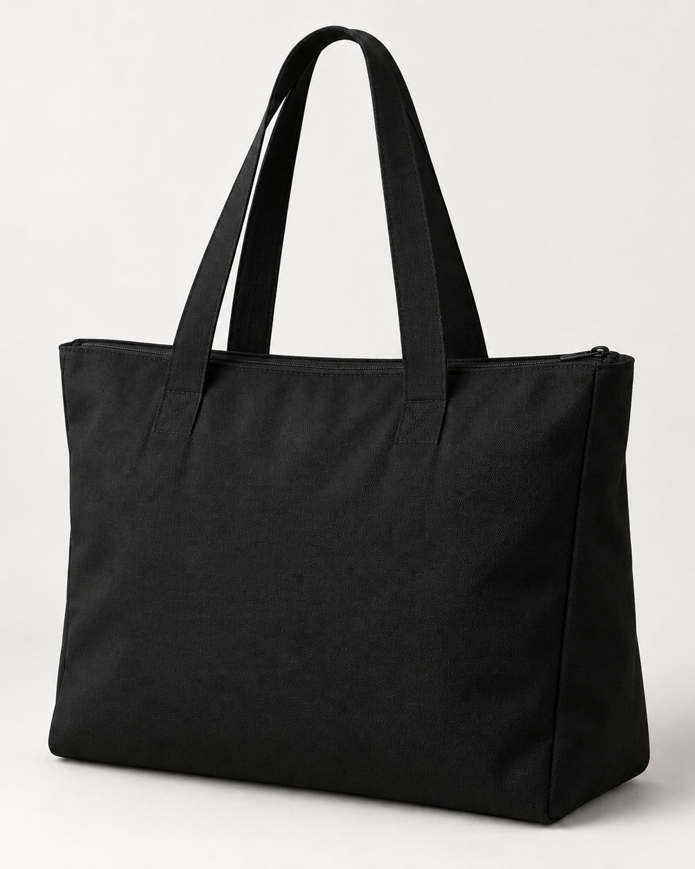 Akumi Dayform Tote in Black, rear studio concept visualization; proposed design pending sample confirmation.