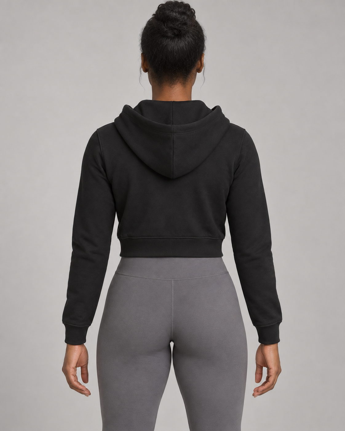 AI-generated design concept: Formline Cropped Zip Hoodie in Onyx, back view.