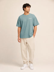 Akumi Gridsoft Waffle Tee in Lagoon Mist hero studio look
