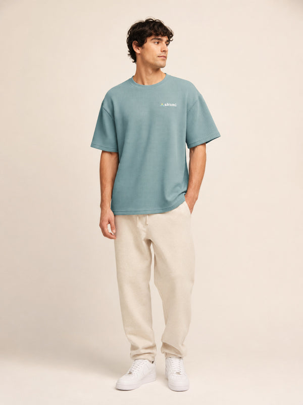 Akumi Gridsoft Waffle Tee in Lagoon Mist hero studio look