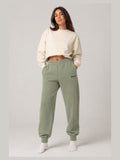 Akumi Groundform Sweatpant in Washed Sage, hero front three-quarter studio view
