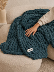 Akumi Groundloop Weighted Blanket Deep Harbor tactile weight cue with sewn woven hem label