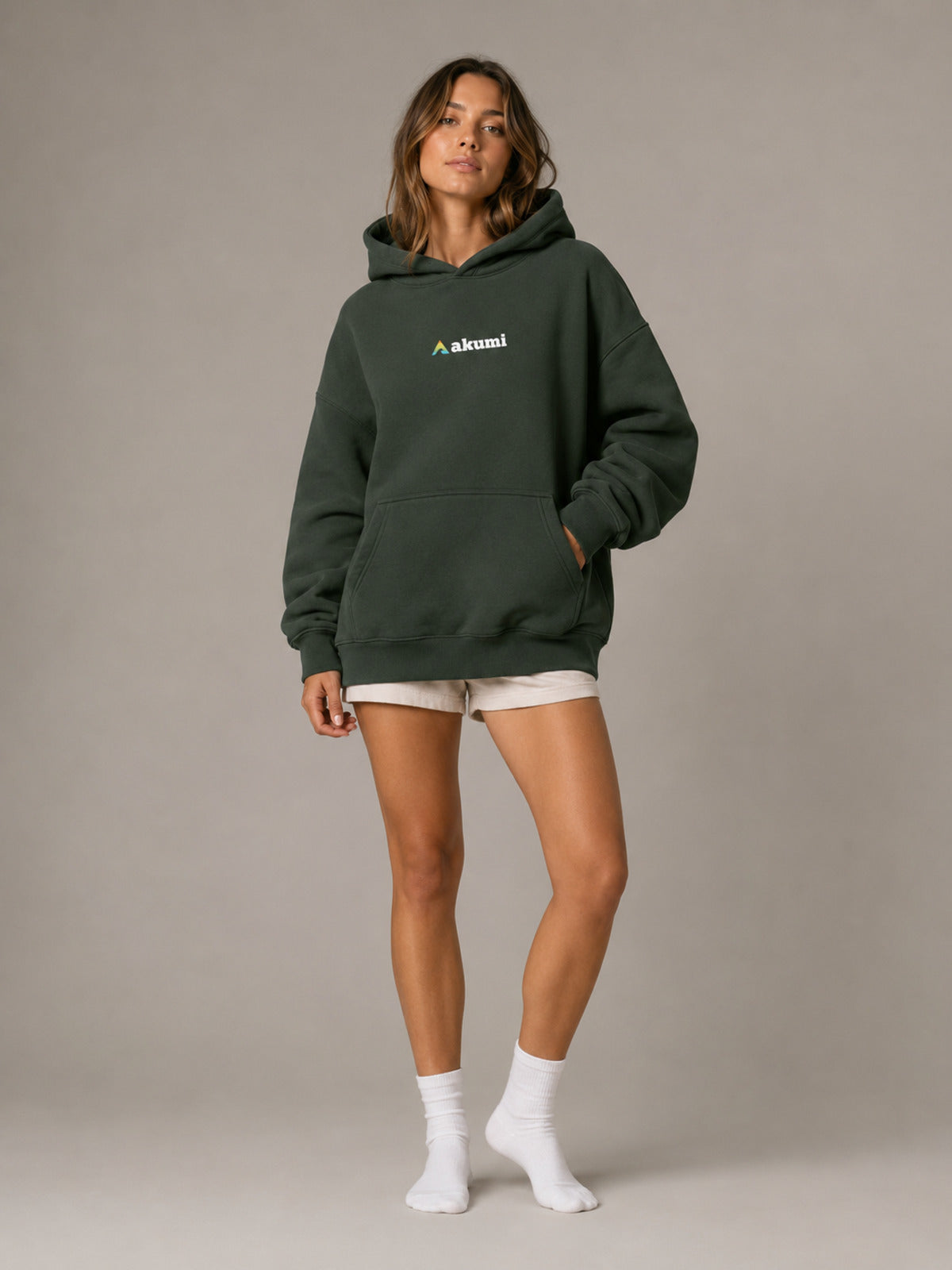 Akumi Hushweight Hoodie in Ash Pine female front three-quarter studio view