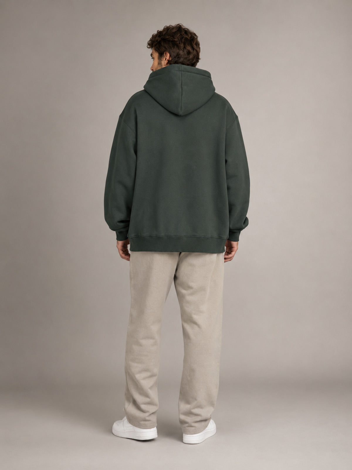 Akumi Hushweight Hoodie in Ash Pine male full-body back studio view