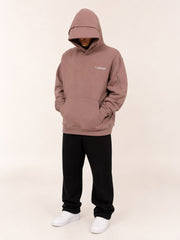 Akumi Layover Rest Hoodie in Terminal Rose hood shade feature