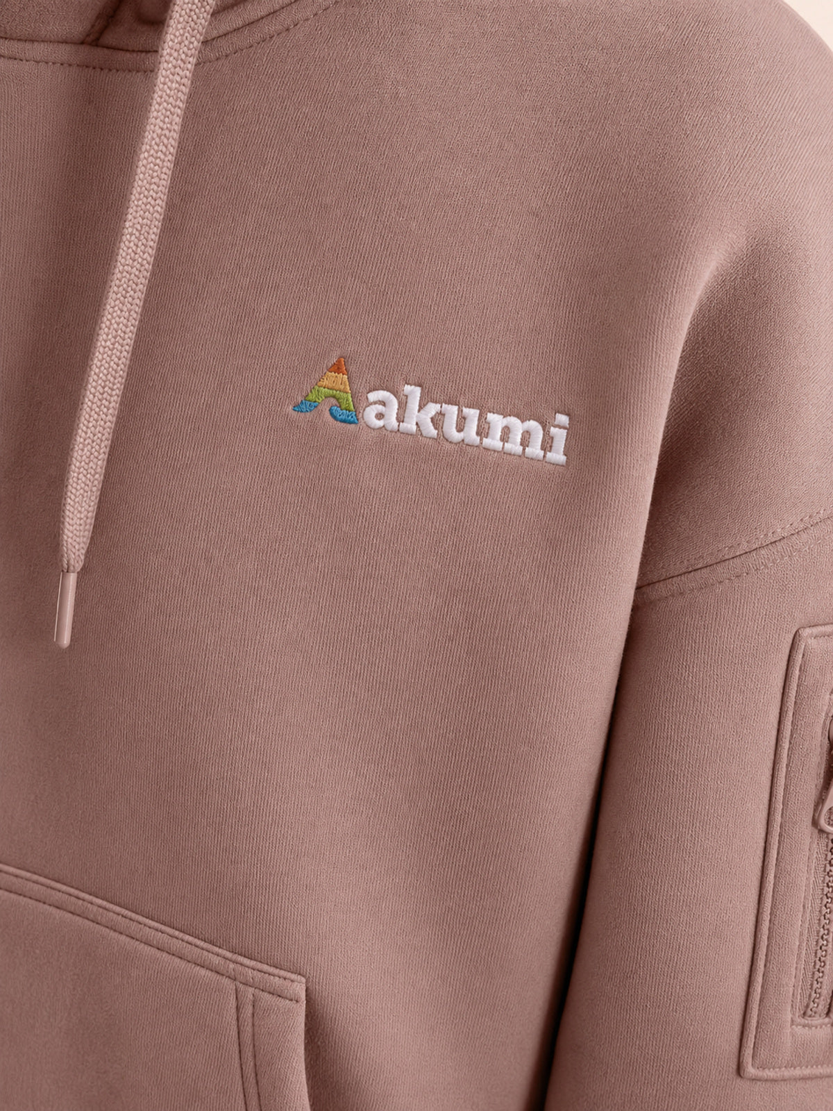 Akumi Layover Rest Hoodie in Terminal Rose embroidered logo and sleeve pocket detail