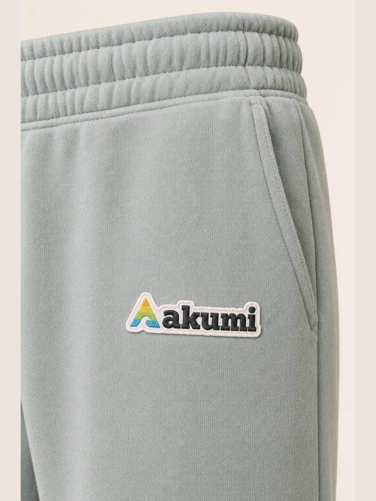 Akumi Lightform Straight-Leg Sweatpant in Aqua Mist, Akumi logo and waistband detail