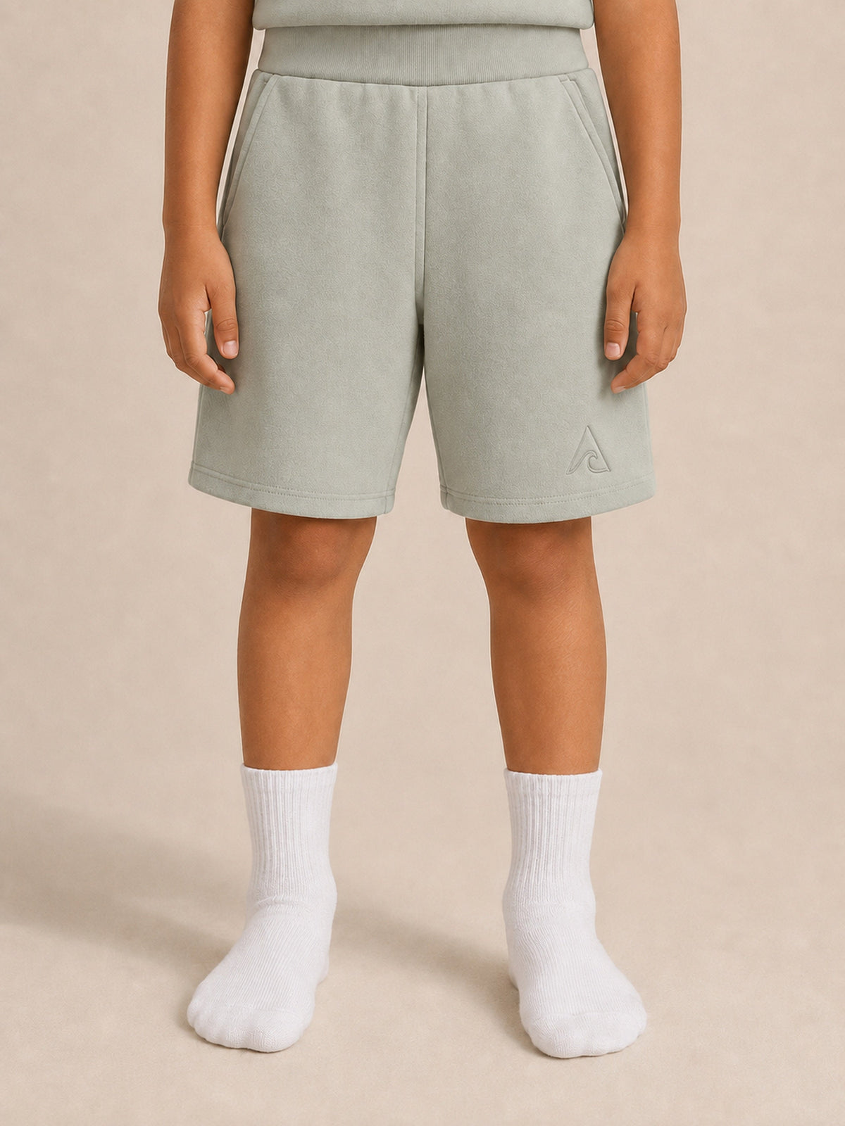 Akumi Little Driftlight Short in Cloud Sage front crop with corrected A-wave logo