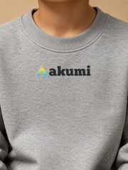 Akumi Little Varsitymark Crew Campus Grey close-up showing realistic raised embroidered Akumi logo detail