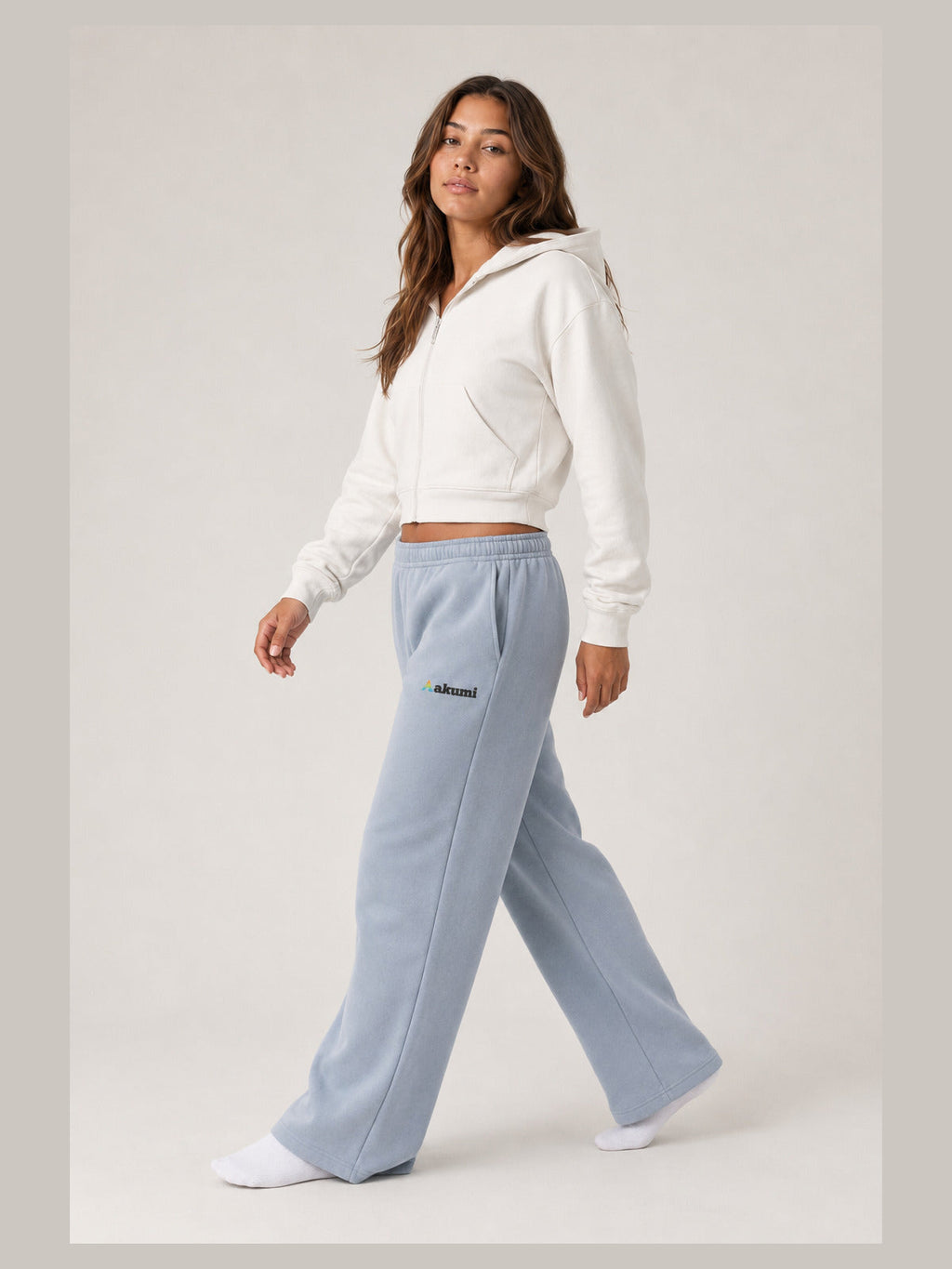 Akumi Openform Straight-Leg Sweatpant in Rainwash Blue, side walking studio view