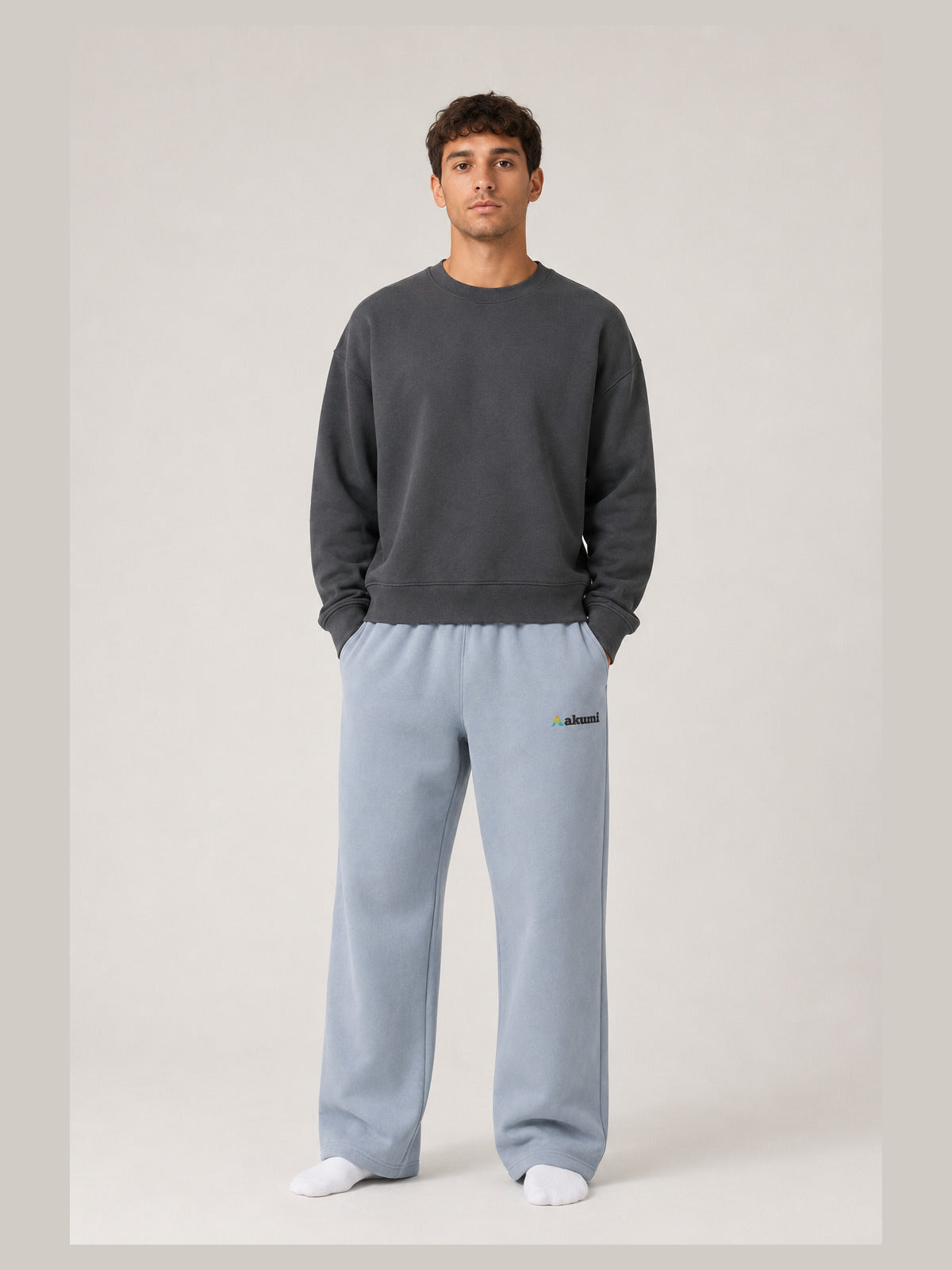 Akumi Openform Straight-Leg Sweatpant in Rainwash Blue, unisex male front studio view