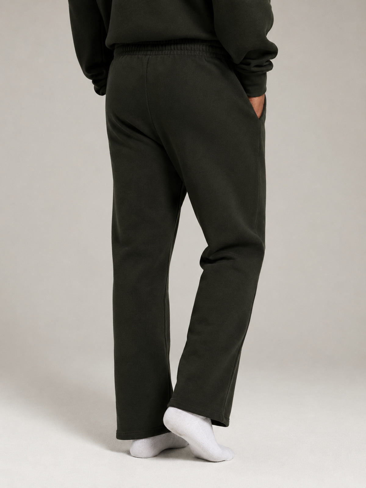 Akumi Openline Straight Pant in Onyx Moss close rear three-quarter leg view