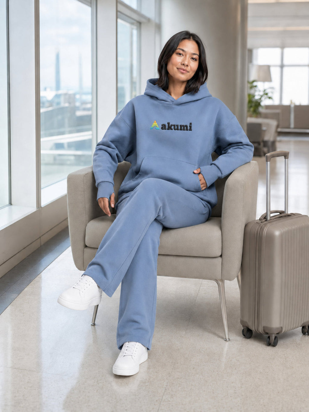 Dust Blue##Akumi Passage Hoodie, seated travel lifestyle