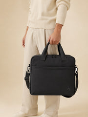 Akumi Portline 24L Travel Tote Ash Black lifestyle carry view