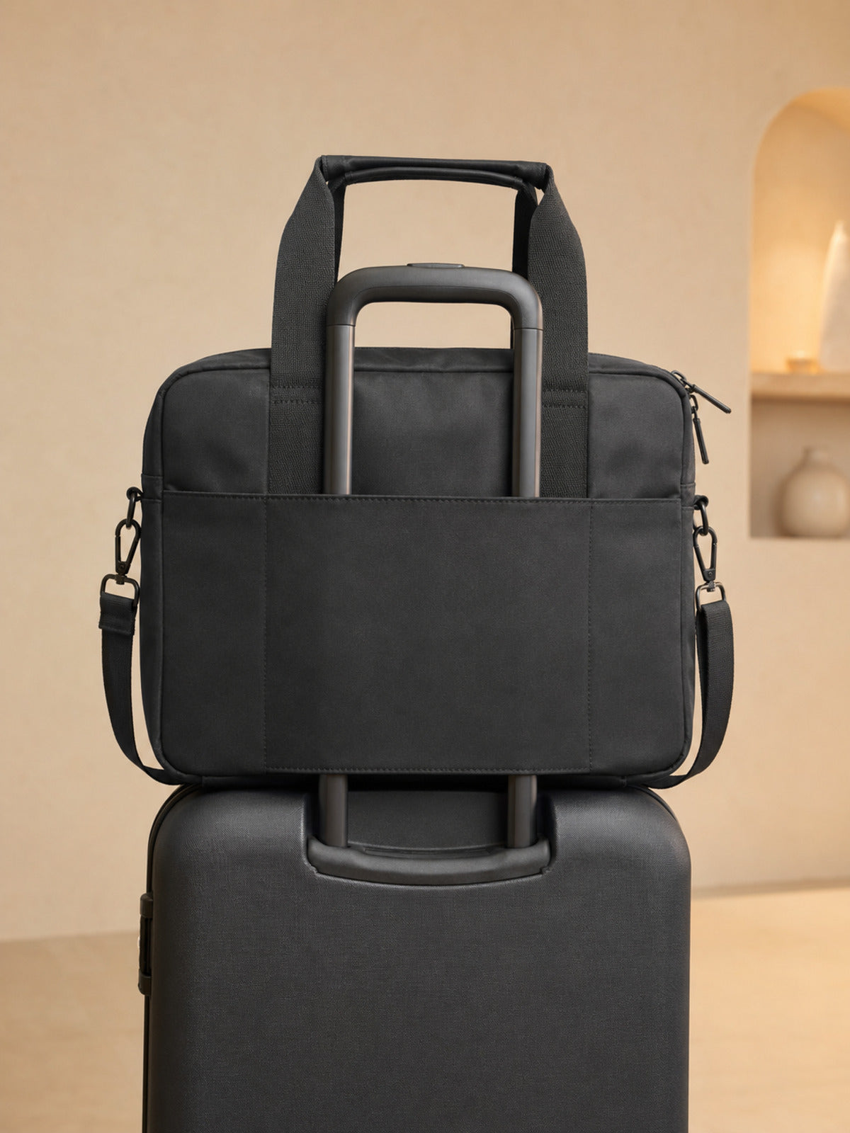 Akumi Portline 24L Travel Tote Ash Black suitcase sleeve view