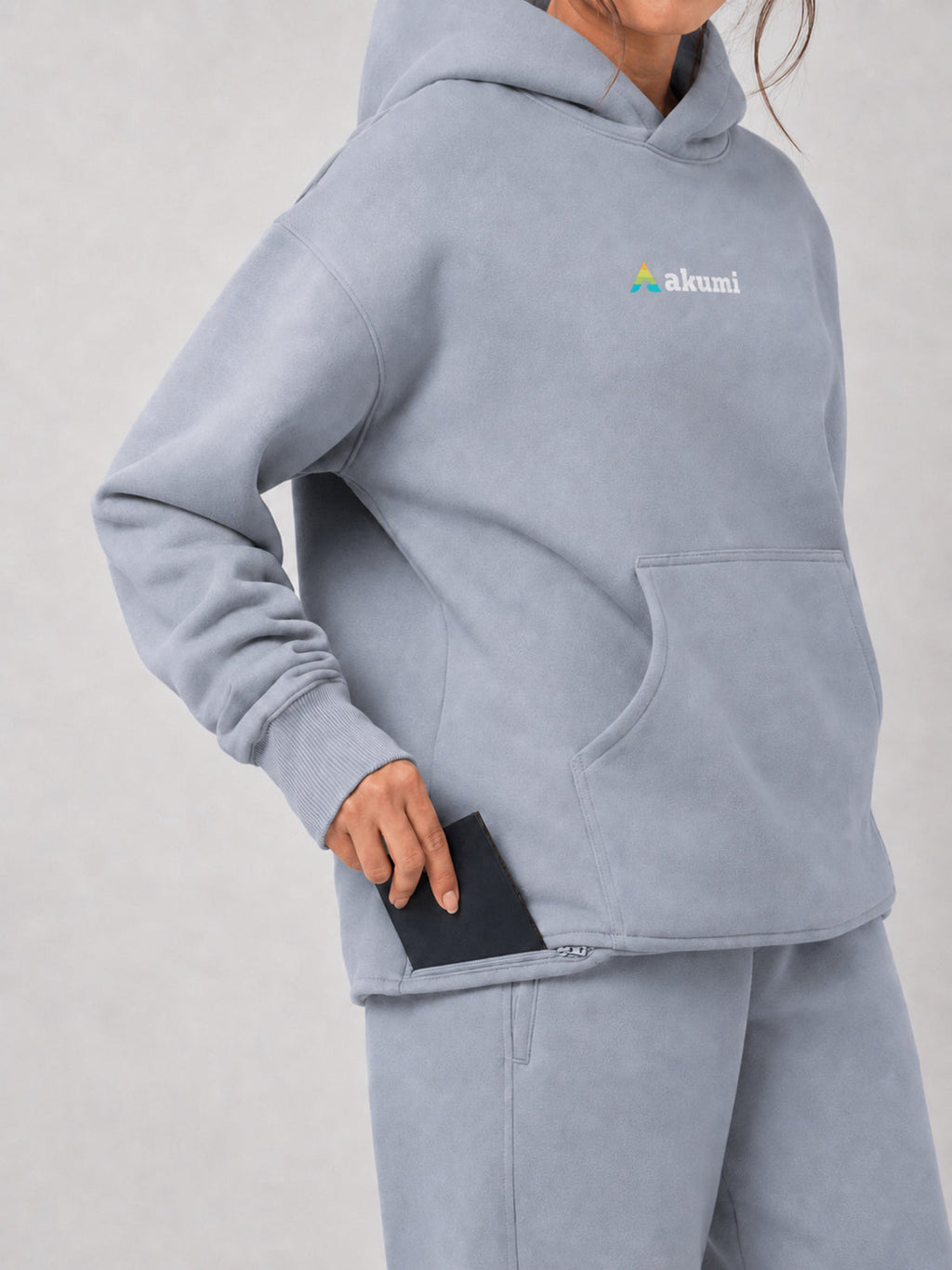 Akumi Quiet Transit Hoodie concealed travel pocket detail