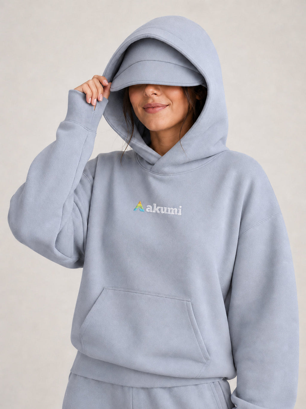 Akumi Quiet Transit Hoodie stowaway rest visor and sculpted hood detail