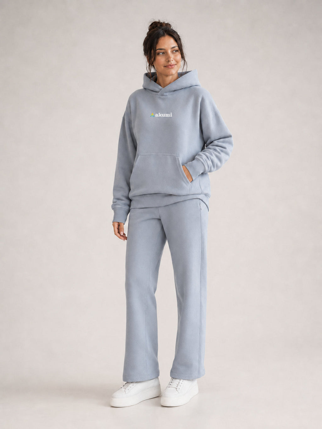 Akumi Quiet Transit Hoodie in Slate Mist, three-quarter studio view