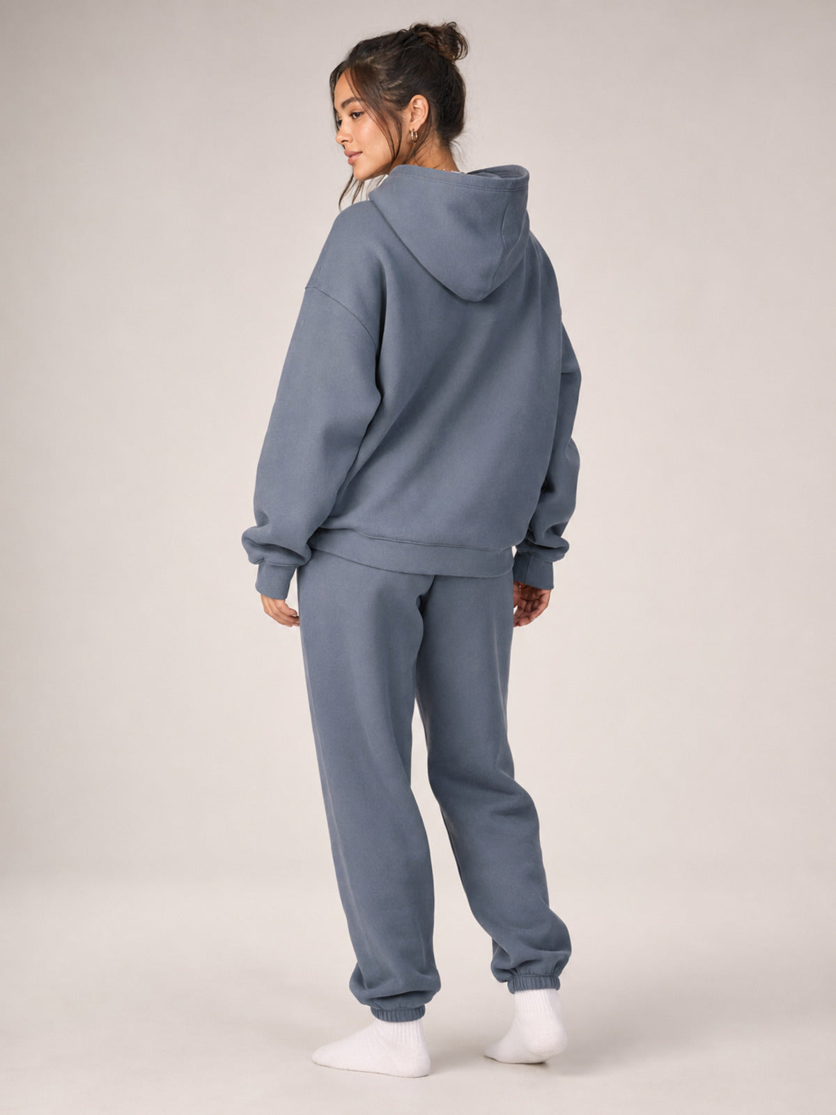 Akumi Reserve Pocket Hoodie in Harbor Ash female rear three-quarter studio view