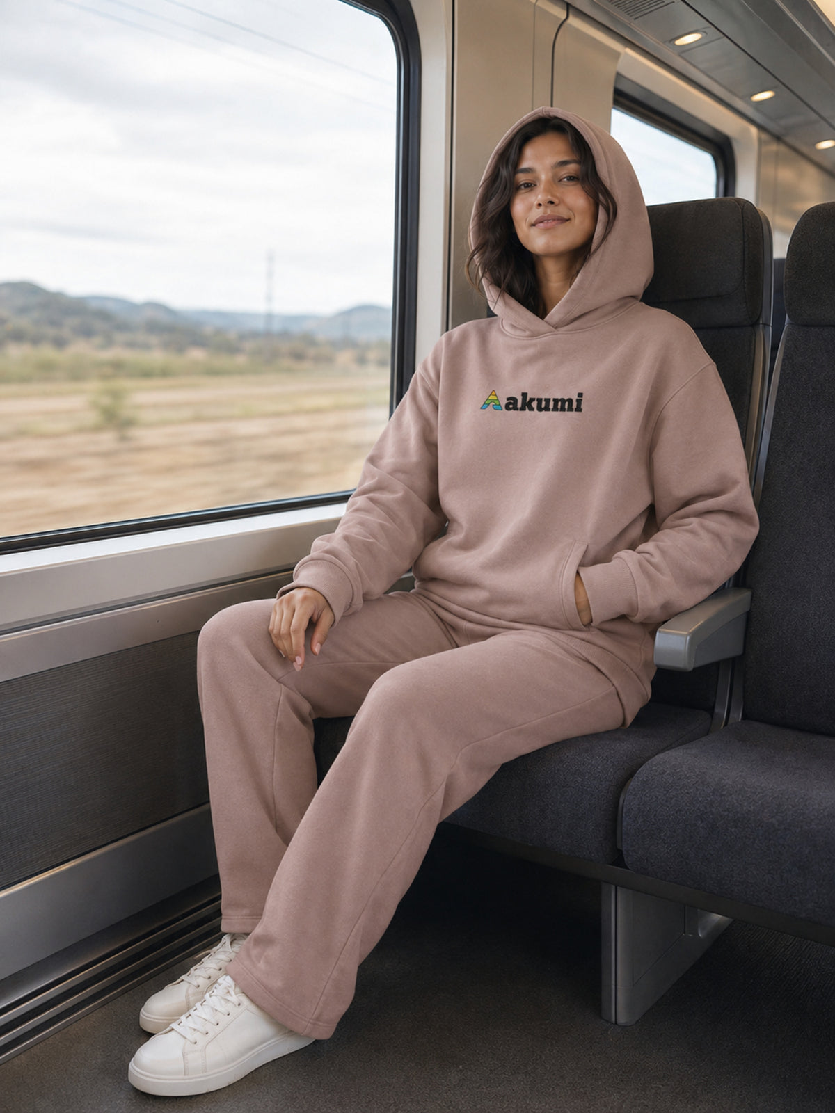 Clay Mist##Akumi Restframe Hoodie, seated train lifestyle