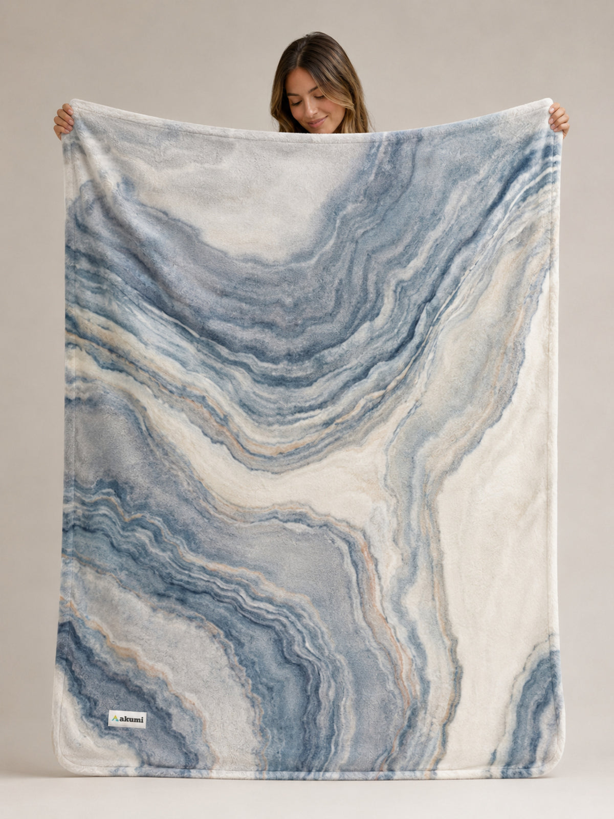 Akumi Shoreline Blanket in Mineral Tide held open to show full pattern