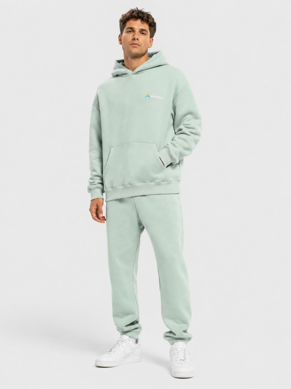 Akumi Softglow Hoodie in Glacier Mint male front three-quarter studio view