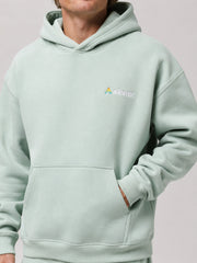 Akumi Softglow Hoodie in Glacier Mint embroidery and pocket detail