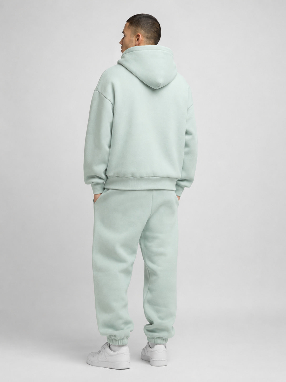 Akumi Softglow Hoodie in Glacier Mint male back studio view