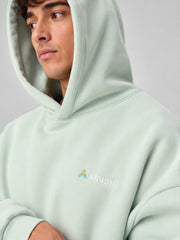 Akumi Softglow Hoodie in Glacier Mint hood and embroidery detail