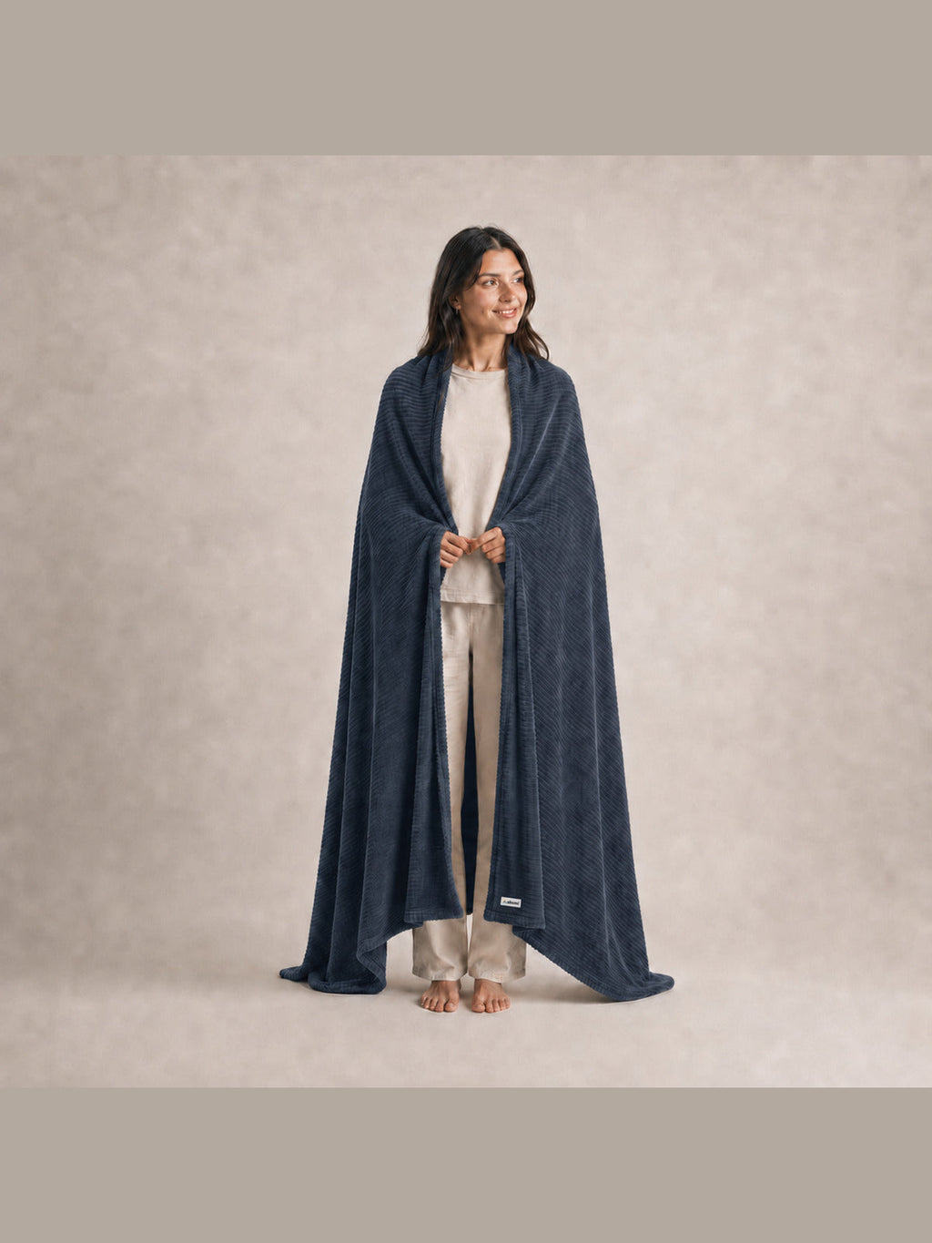 Full-body Akumi Still Blanket scale view with consistent woven label