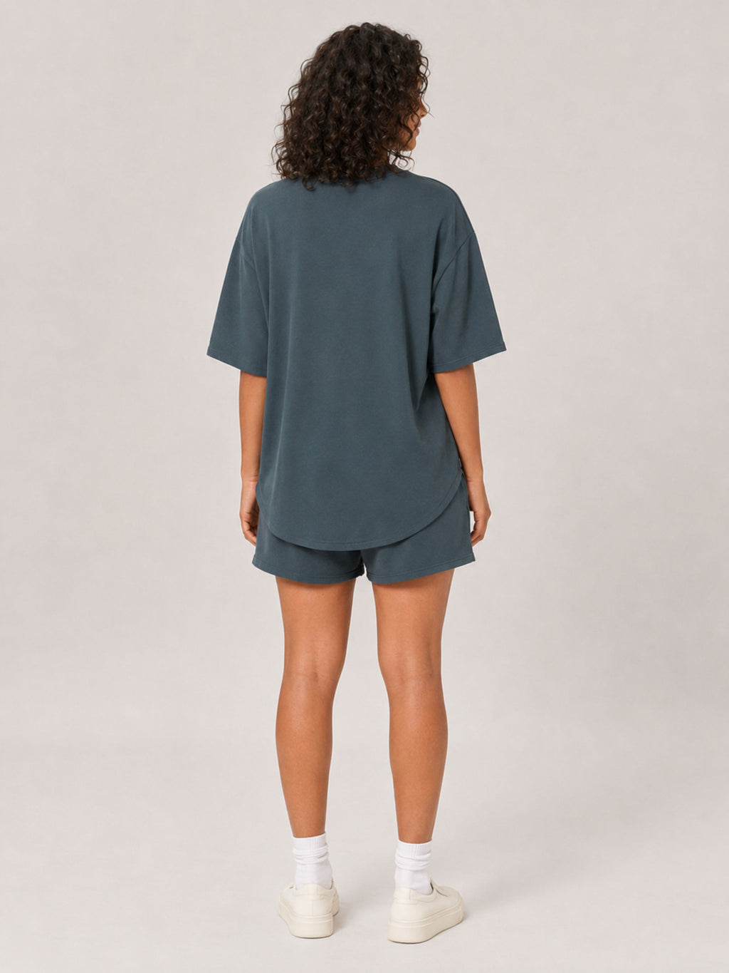 Akumi Stillday Lounge Tee in Juniper Smoke, female back studio view